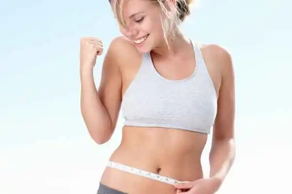 woman happy after fat reduction treatment Manchester