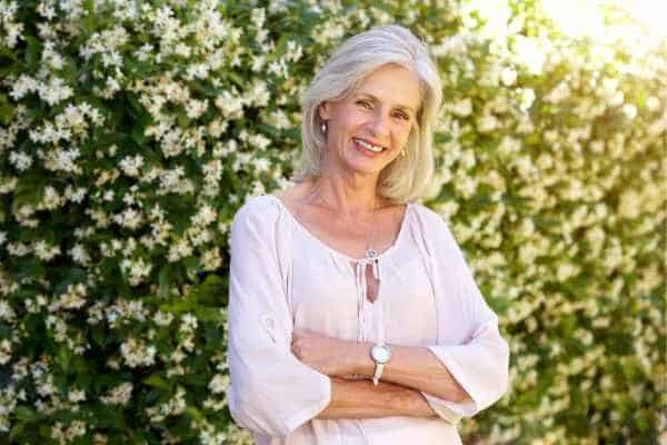 Older woman happy with urinary incontinence treatment Manchester