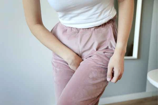 older woman running to the toilet because of urinary incontinence Manchester