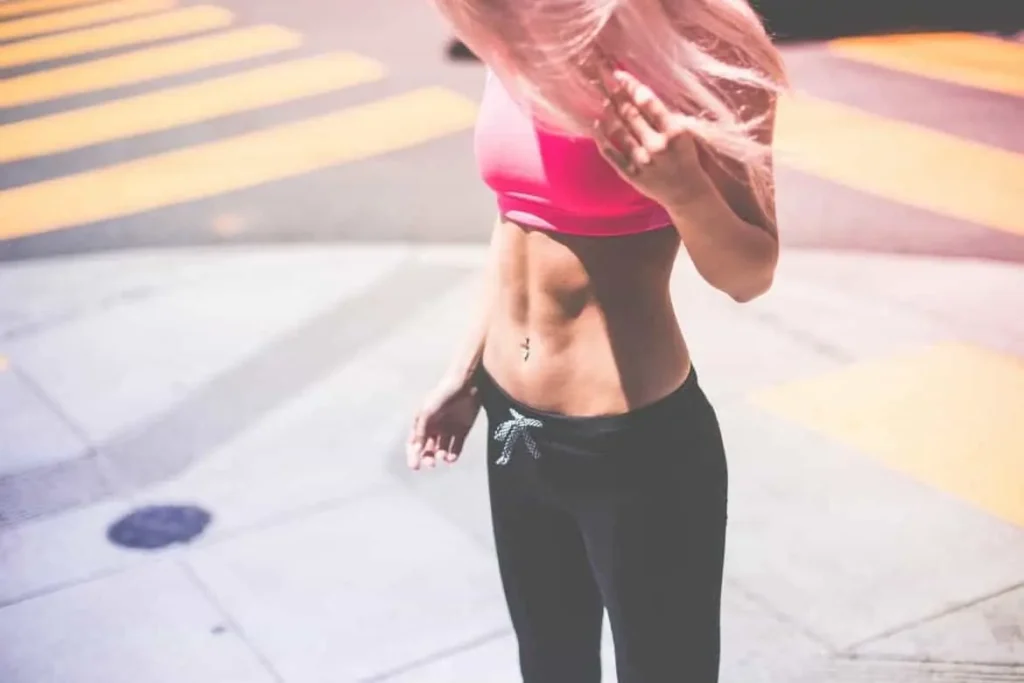 Woman with toned stomach after LA-EMS Body Sculpting Treatment Manchester